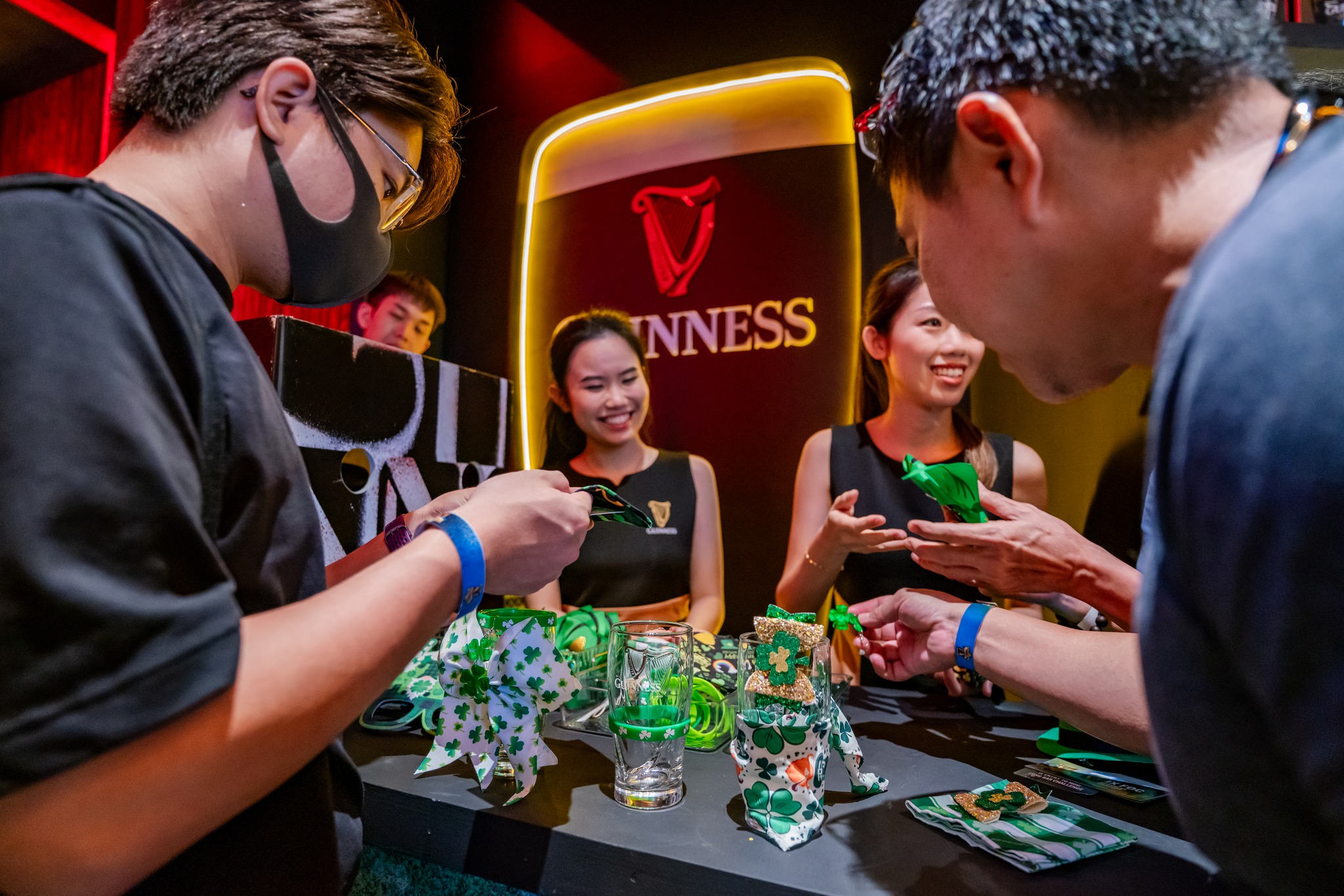 Guests personalising their Guinness glasses with lucky charms at Arthur's Storehouse, Pavilion KL